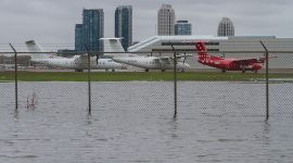Floodwaters encroach the tarmac, Toronto City Center Airport, Toronto Islands