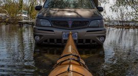 Kayaking past abandoned automobiles, Ward's Island, Toronto Islands