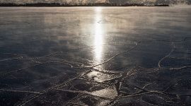 Sunrise over fresh ice in front of the Leslie St Spit, Center Island, Toronto Islands