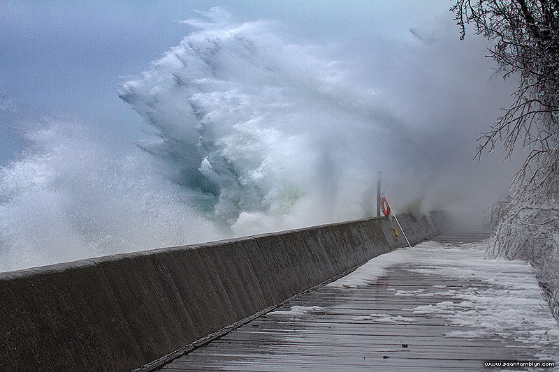 Wave exploding against breakwall, Boardwalk, Toronto Islands