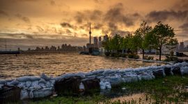 Stormclouds over sandbags in front of ferry docks, Ward's Island, Toronto Islands