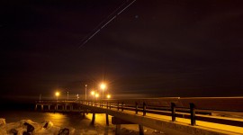 Space shuttle Discovery and ISS over pier, Centre Island, Toronto Islands