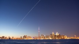 Space shuttle Discovery and ISS over Toronto skyline, Centre Island, Toronto Islands