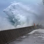 Wave exploding against breakwall, Boardwalk, Toronto Islands
