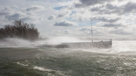 High winds push waves over the Rapids Queen, Algonquin Island, Toronto Islands
